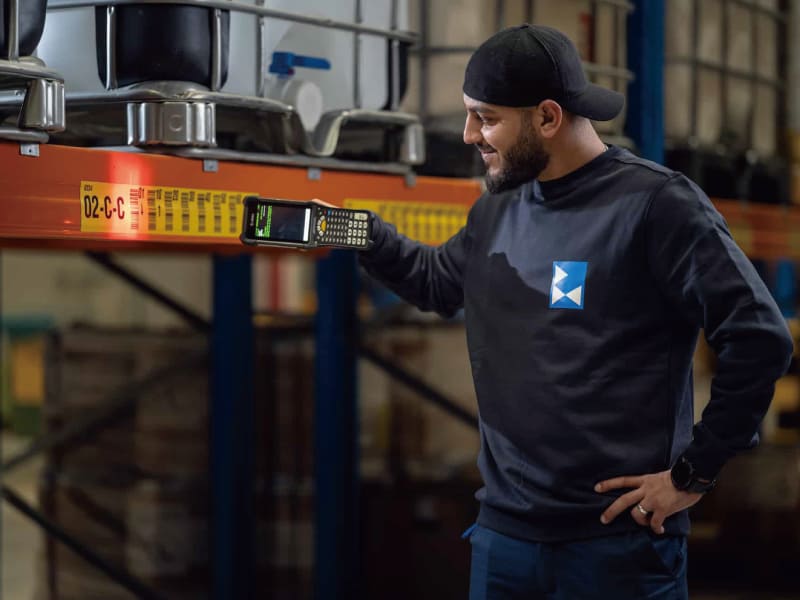 An image showing a man inspecting the warehouse safety for reference